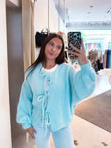 Kurze Oversized Strickjacke mit Schleifen Hellblau