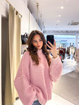 Oversized Strickpullover mit Stehkragen und farbigen Details Rosa