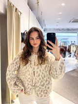 Kurze Oversized Strickjacke mit Schleifen und Leomuster Beige