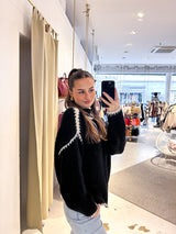 Strickpullover mit farbiger Naht Schwarz