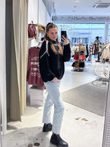 Strickpullover mit farbiger Naht Schwarz