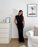 Jumpsuit mit Zierknöpfen Schwarz