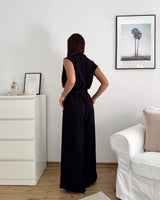 Jumpsuit mit Zierknöpfen Schwarz