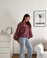 Ballon Strickpullover mit Leomuster Weinrot/Rosa