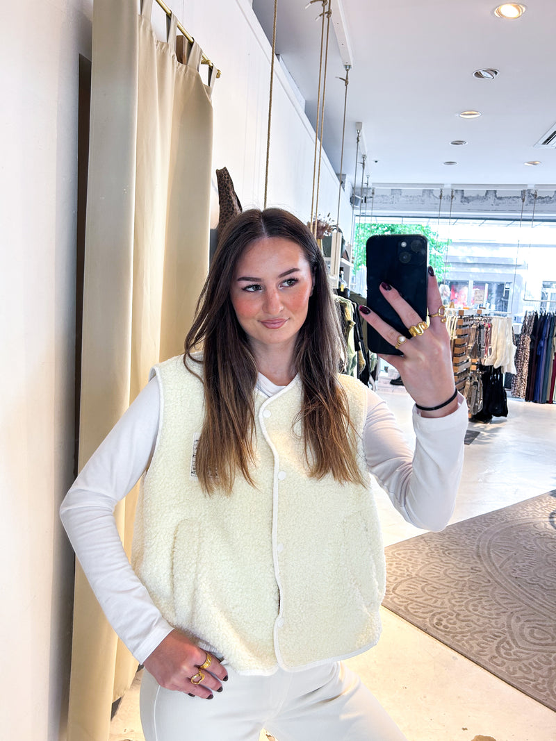 Kurze Teddy Weste mit Knopfleiste und Smiley Creme