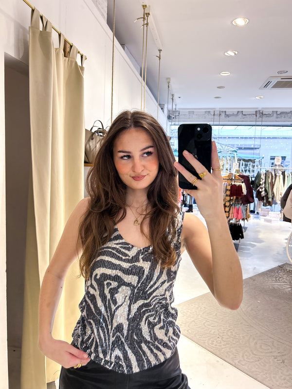 Top mit Pailletten und Zebramuster