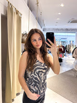 Top mit Pailletten und Zebramuster