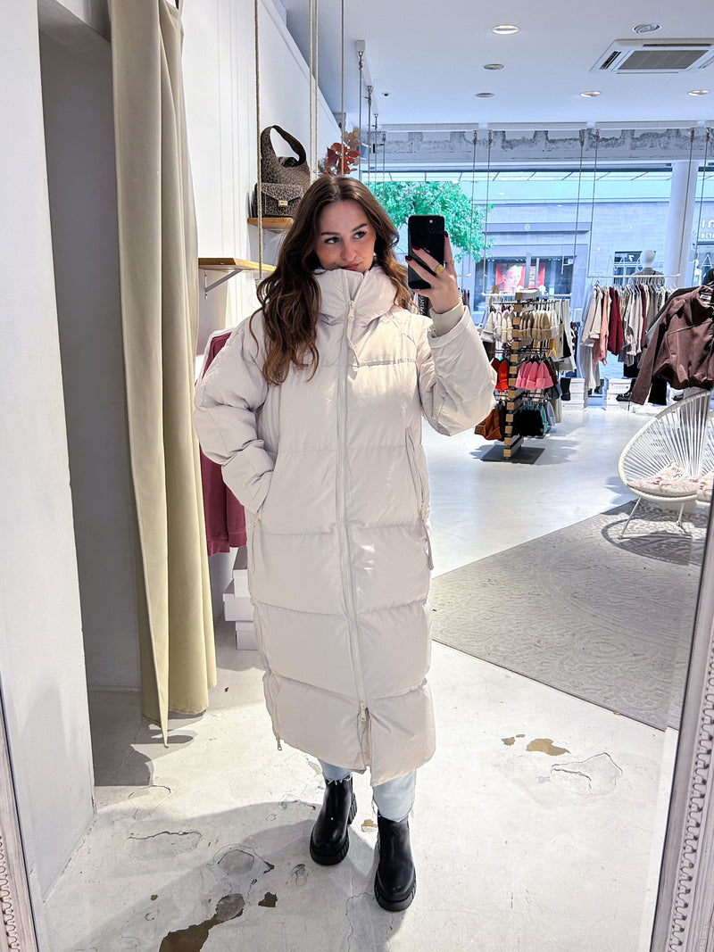 Lange Puffer Winterjacke Beige