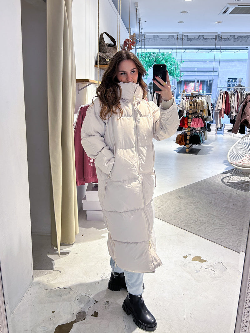 Lange Puffer Winterjacke Beige