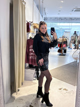 Kurzer Rock mit Pailletten Schwarz