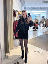 Rock mit Pailletten und Leomuster Schwarz