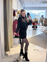 Rock mit Pailletten und Leomuster Schwarz