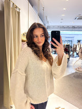 Kurzer Oversized Strickpullover mit V-Ausschnitt Beige