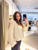 Kurzer Oversized Strickpullover mit V-Ausschnitt Beige