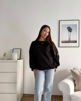 Sweater mit Patch Schwarz