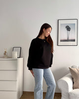 Sweater mit Patch Schwarz