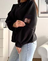 Sweater mit Patch Schwarz