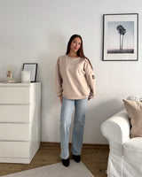 Sweater mit Patch Beige