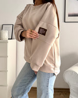 Sweater mit Patch Beige