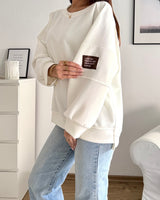 Sweater mit Patch Weiß